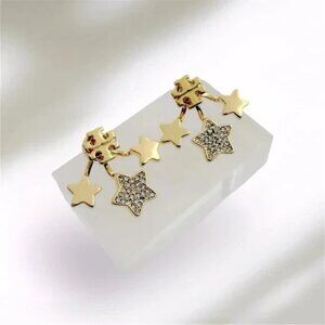 Tory Burch Kira Shooting Star Gold Plated Stud Earrings.